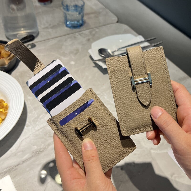 Pull-out card holder: a compact, premium genuine leather case.