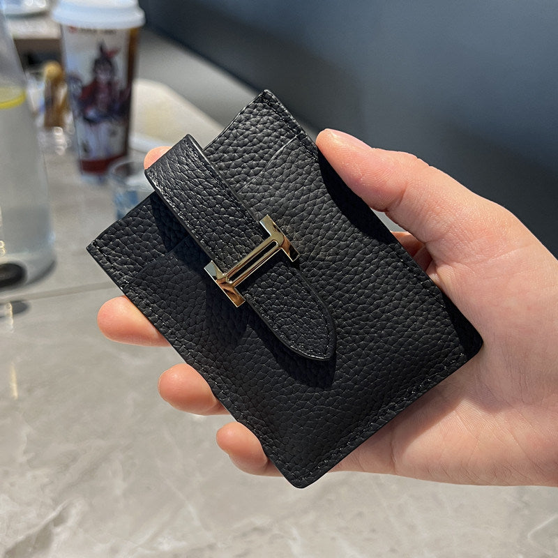 Pull-out card holder: a compact, premium genuine leather case.