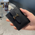 Pull-out card holder: a compact, premium genuine leather case.