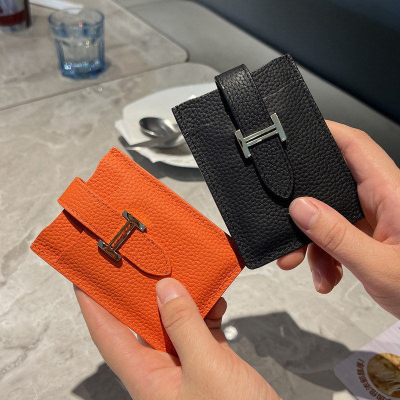 Pull-out card holder: a compact, premium genuine leather case.